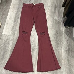 Altar’d State burgundy distressed flare jeans, size 27